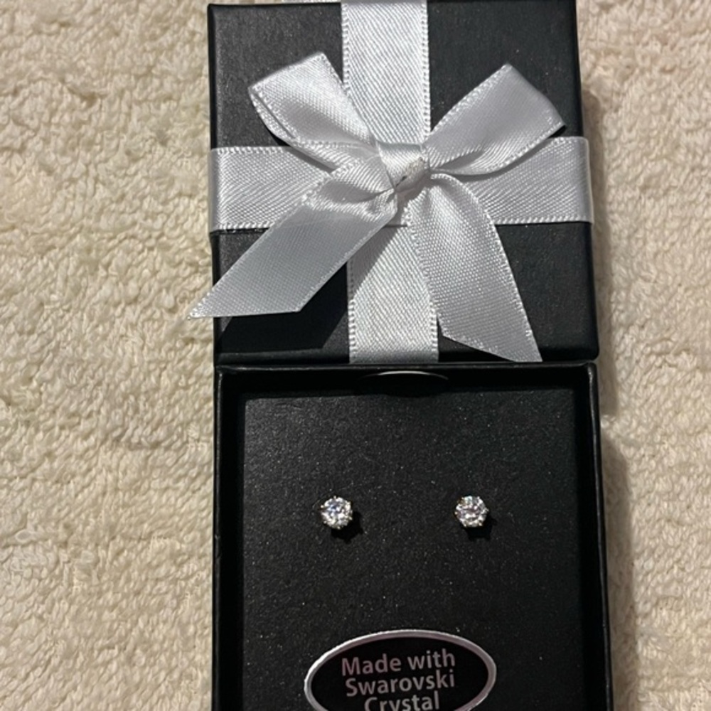 Elegant Black Gift Box with White Ribbon and a nice pair of stud earrings.